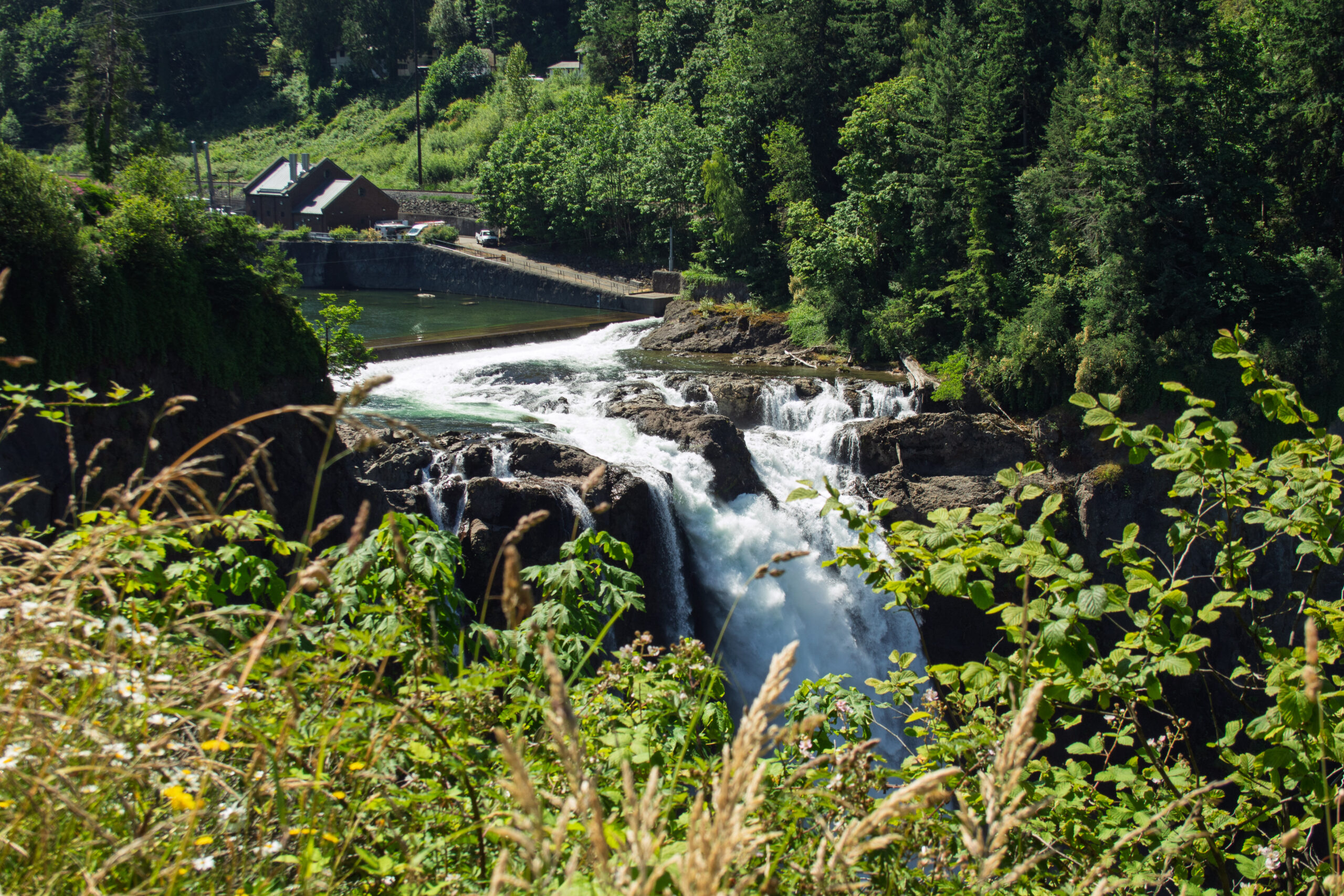 The view from the top of Snoqualmie Falls with a focus on the top of the falls itself